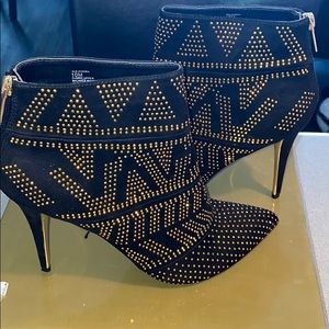 Brand new very unique black with gold detail shoes